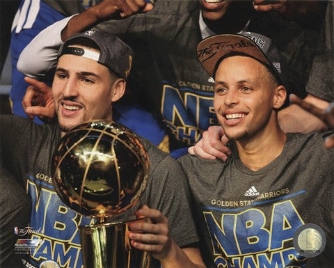 Klay Thompson & Stephen Curry with the NBA Championship Trophy Game 6 of the 2015 NBA Finals